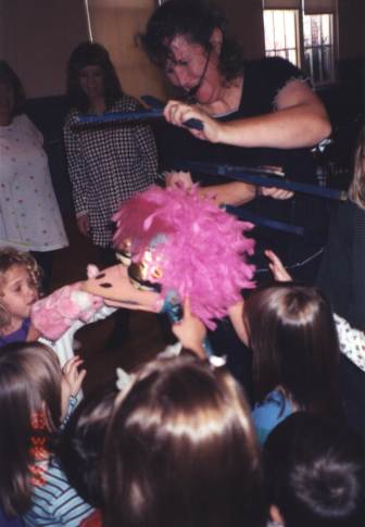 Gladys greets some children