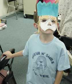 The children wear their own creations
