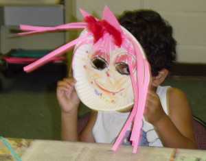 The children wear their own creations