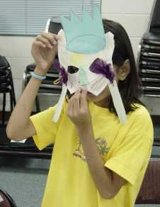 The children wear their own creations