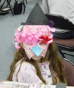 The children wear their own creations